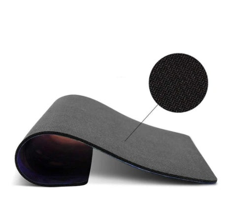 Gray fabric mouse pad with contoured edge and textured surface