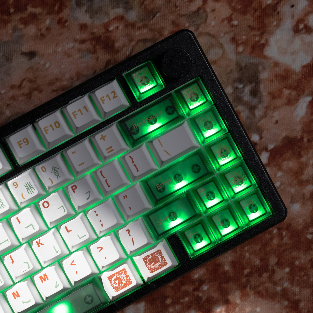 Cherry-profile keycaps with green backlight on white keys and dark modifier caps