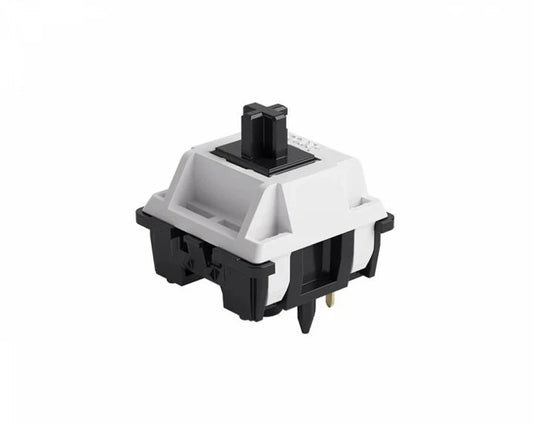 Lubed mechanical keyboard switch with white housing, black stem, and side mounting pins