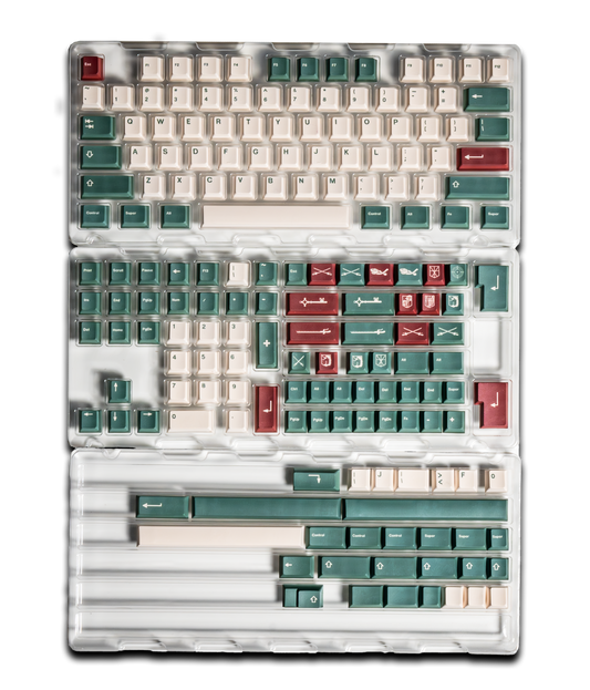Keyboard keycap set display with white, dark green, and red caps in staggered layout