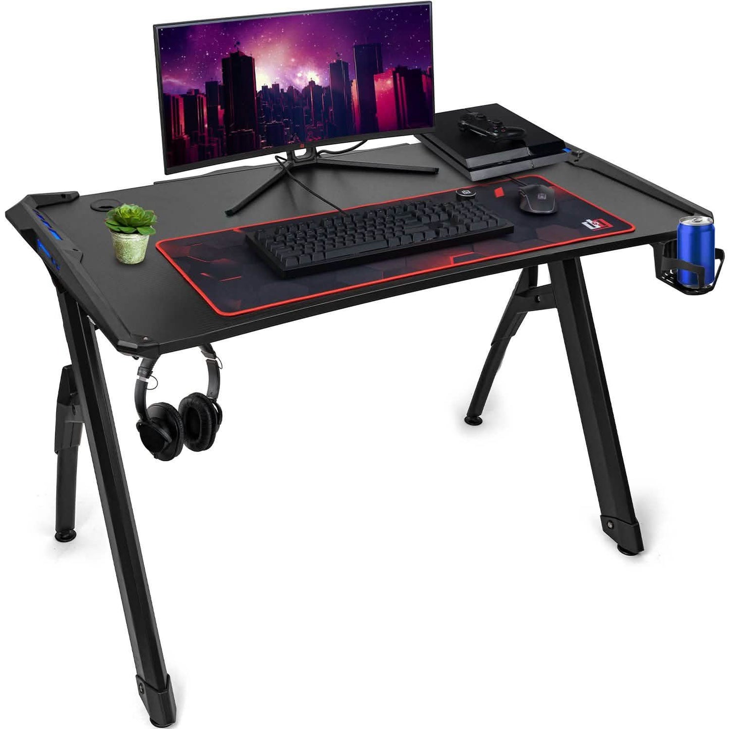 Deco Gear 47 LED gaming desk with monitor, keyboard, headset, and cup holder
