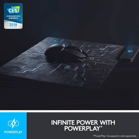 Black wireless gaming mouse on a textured mousepad with blue-lit accents