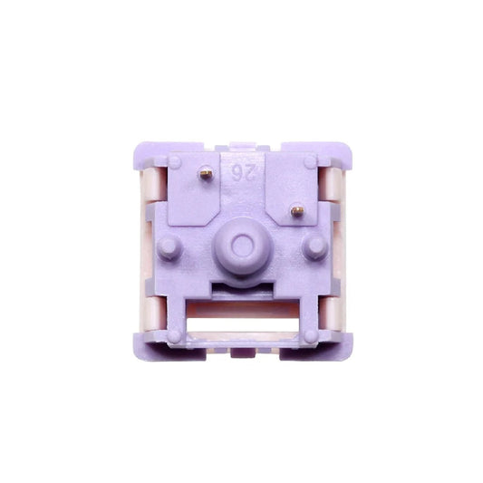 Keyboard switch front view with lavender housing and metal contact pins