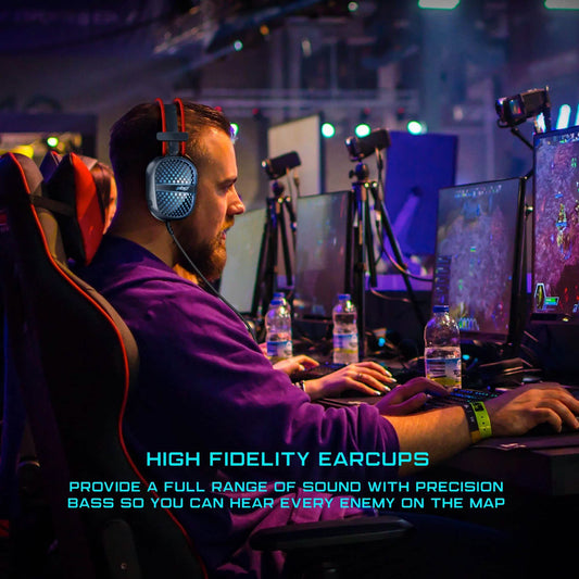 Person wearing over-ear gaming headset with microphone, blue LED earcup lighting