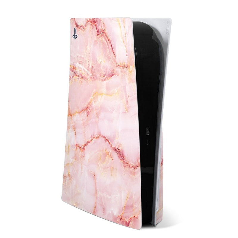 Pink marble PS5 skin with black console side visible