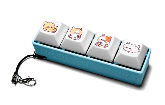 Four-piece keycap fidget with cute animal prints on white keys, teal case, keychain ring