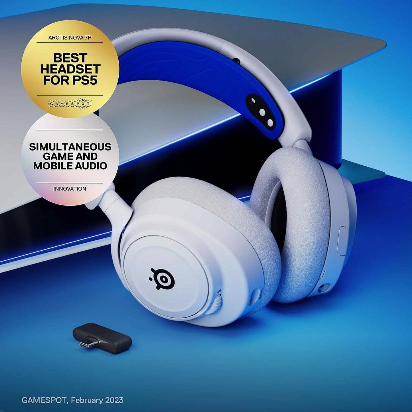 White and blue wireless gaming headset with USB wireless adapter and angled earcups