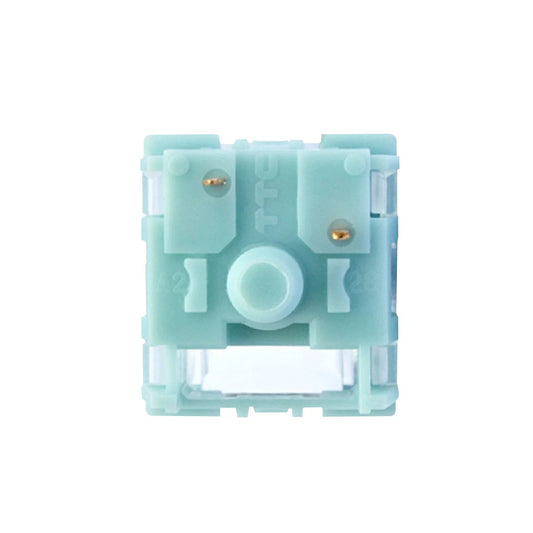 Bluish white mechanical keyboard switch with square top plate and two gold contacts