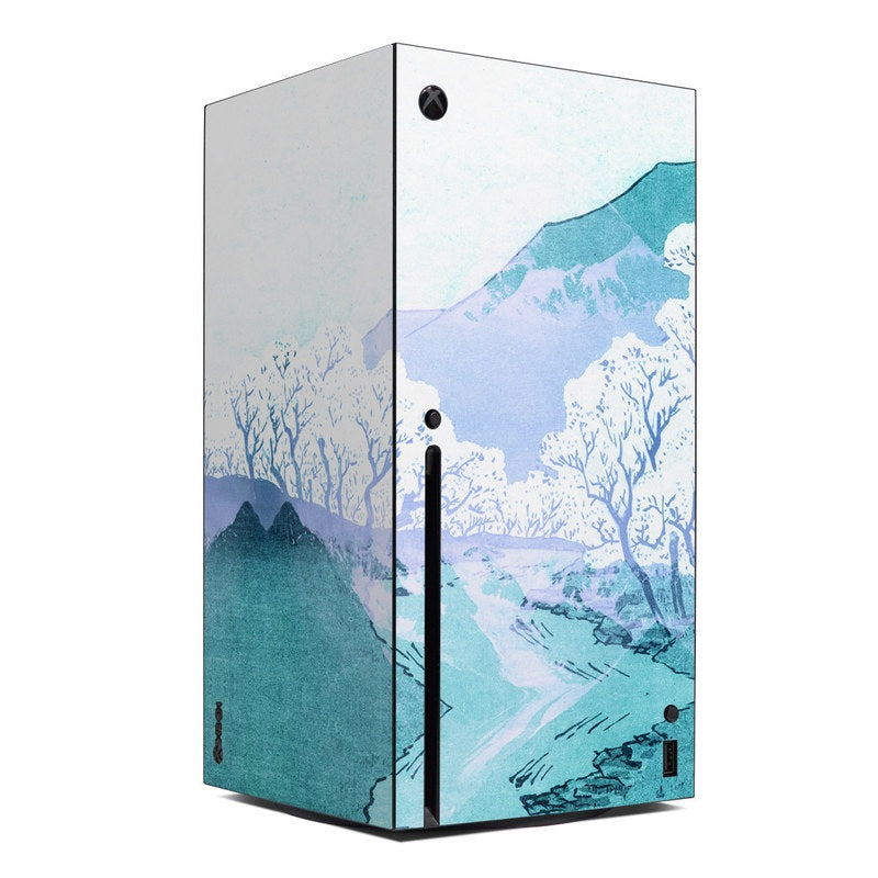 Xbox Series X console skin with blue winter mountain landscape and trees