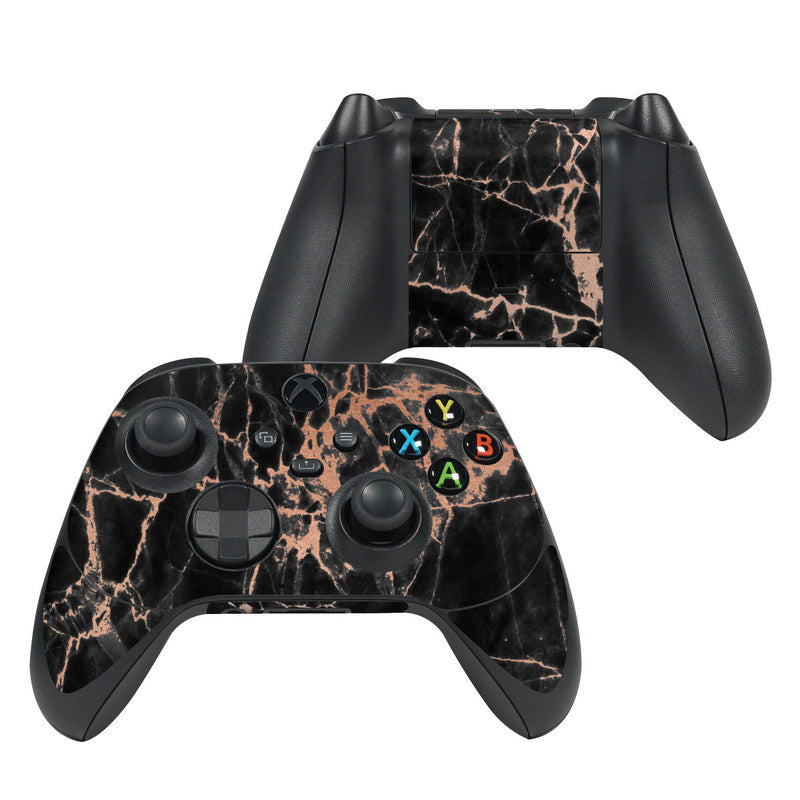 Xbox Series X controller skin with rose quartz marble pattern, black base and pink veining.