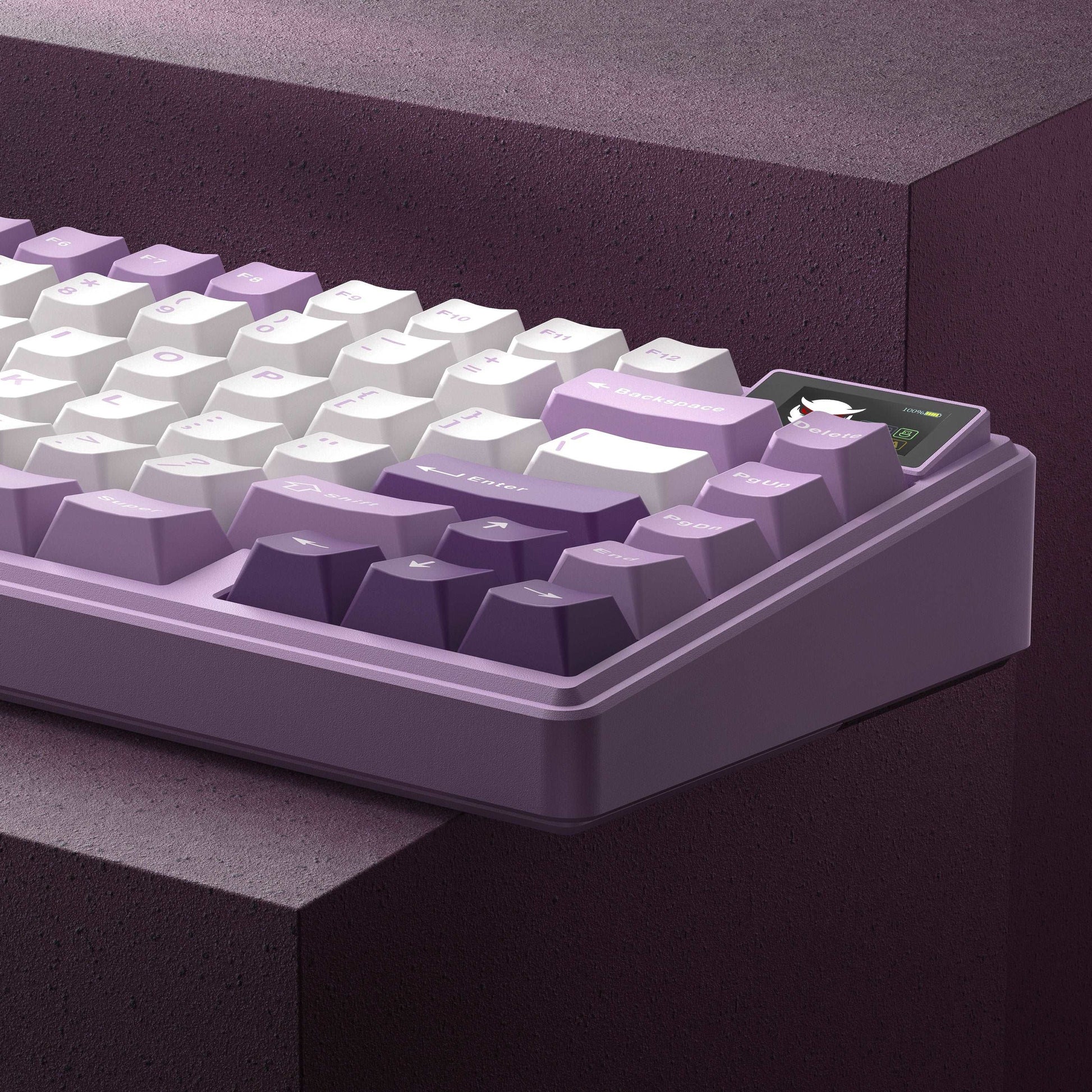 Purple mechanical keyboard close-up with layered keycaps and white legends