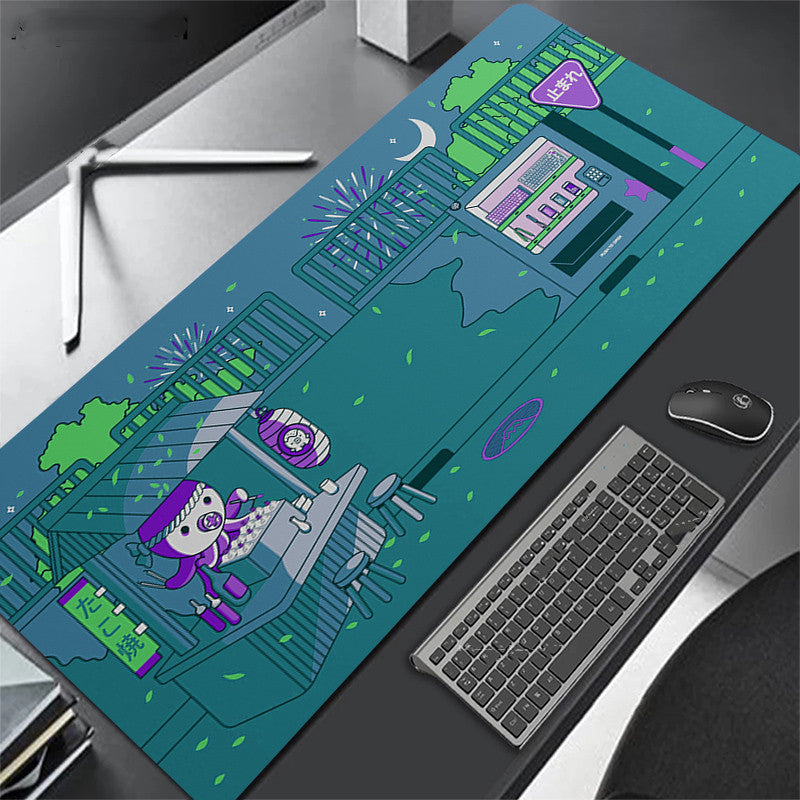 green desk mat with cartoon design on a desk with keyboard and octopus.