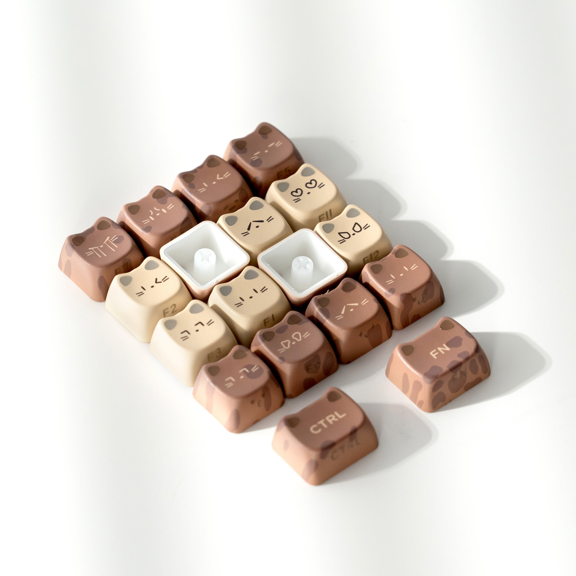 MAO profile keycap set in cocoa and creamy white, cat-themed legends on key tops