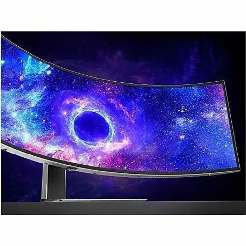 Curved OLED gaming monitor displaying colorful galaxy space wallpaper, front view on stand