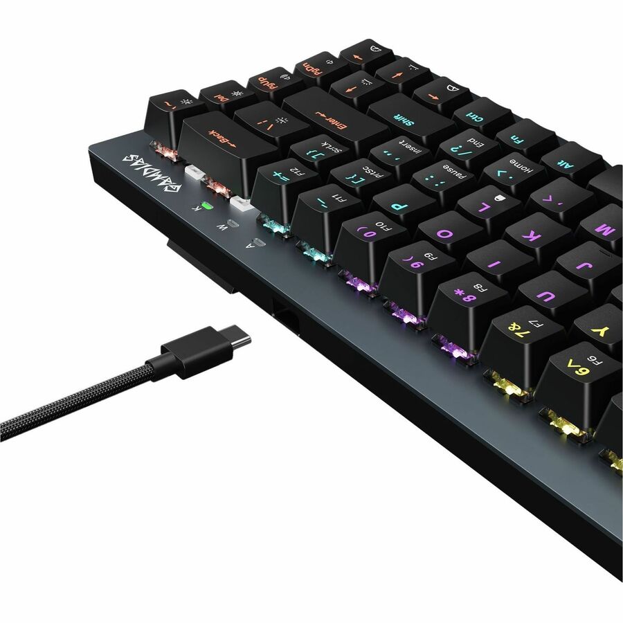 Gaming keyboard close-up with RGB backlit keys and braided USB cable