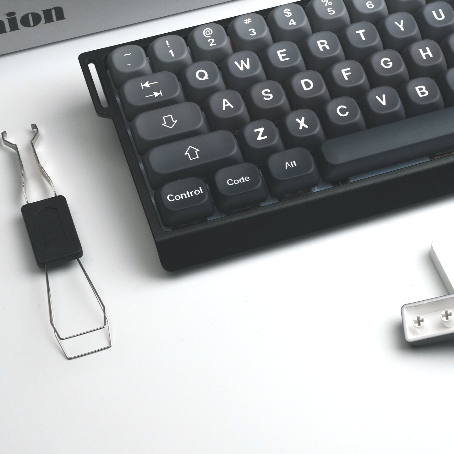 Dark gray PBT keycaps close-up, Control, Code, All and arrow keys