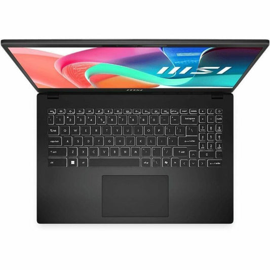 MSI Modern 15 laptop, close-up of black keyboard and large trackpad