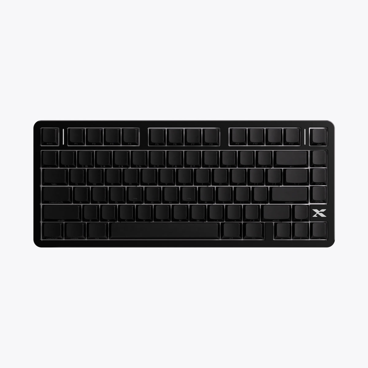 Low-profile mechanical keyboard with black keycaps, unlit key layout