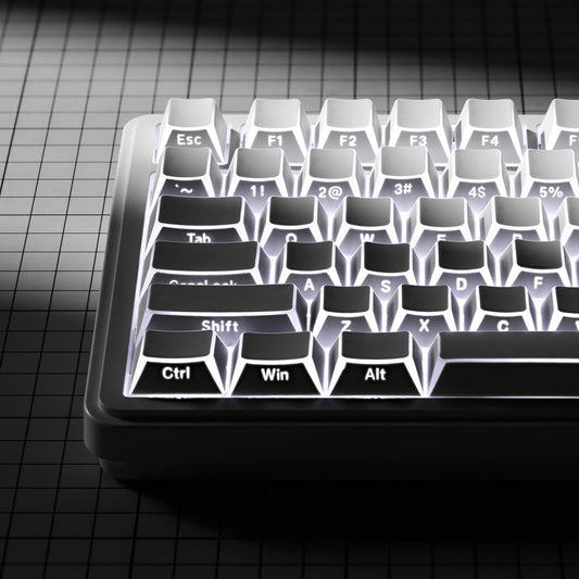 White Cherry-profile keycaps on a keyboard with dark legends shine-through effect