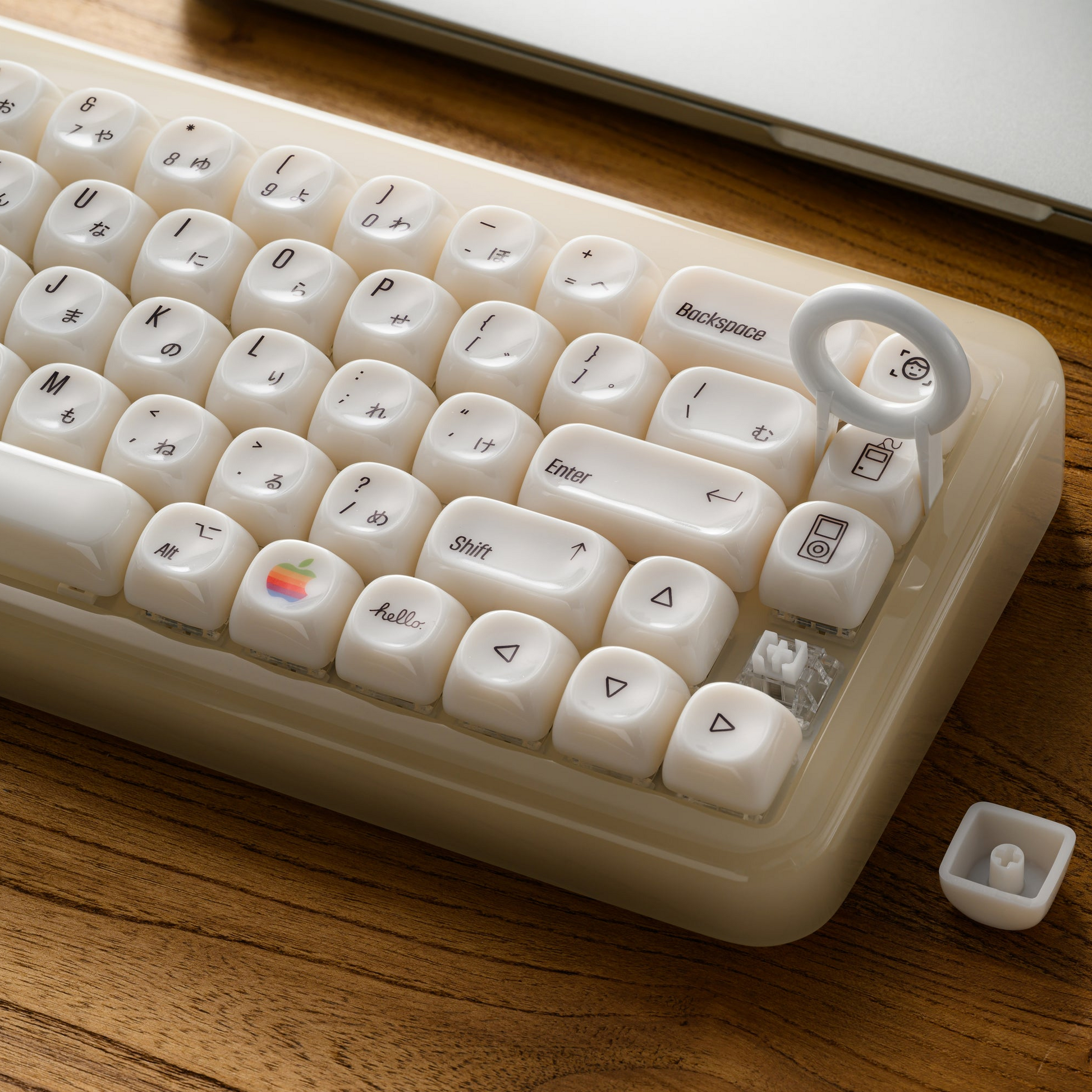 Translucent white MOA keycaps with Japanese legends installed on a compact keyboard
