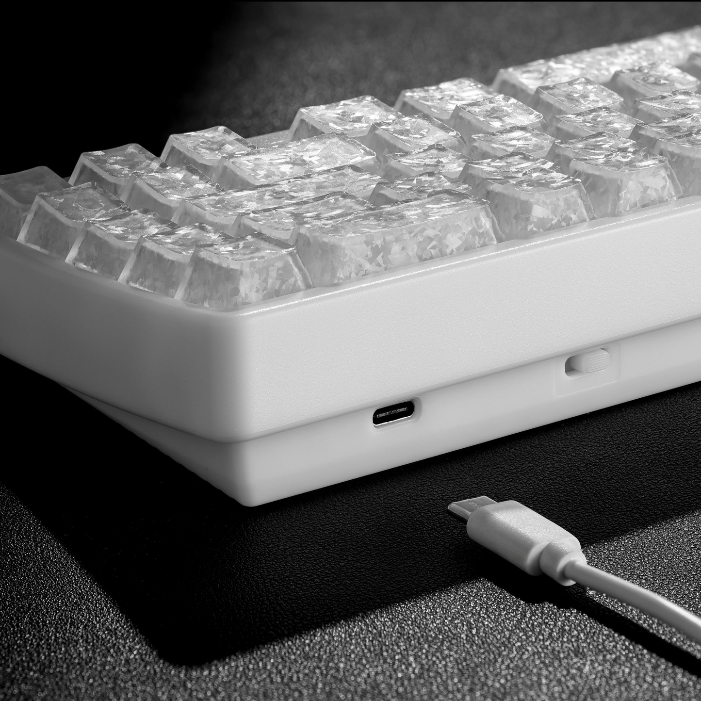 Mechanical keyboard with white case, USB-C port, and visible braided connection cable