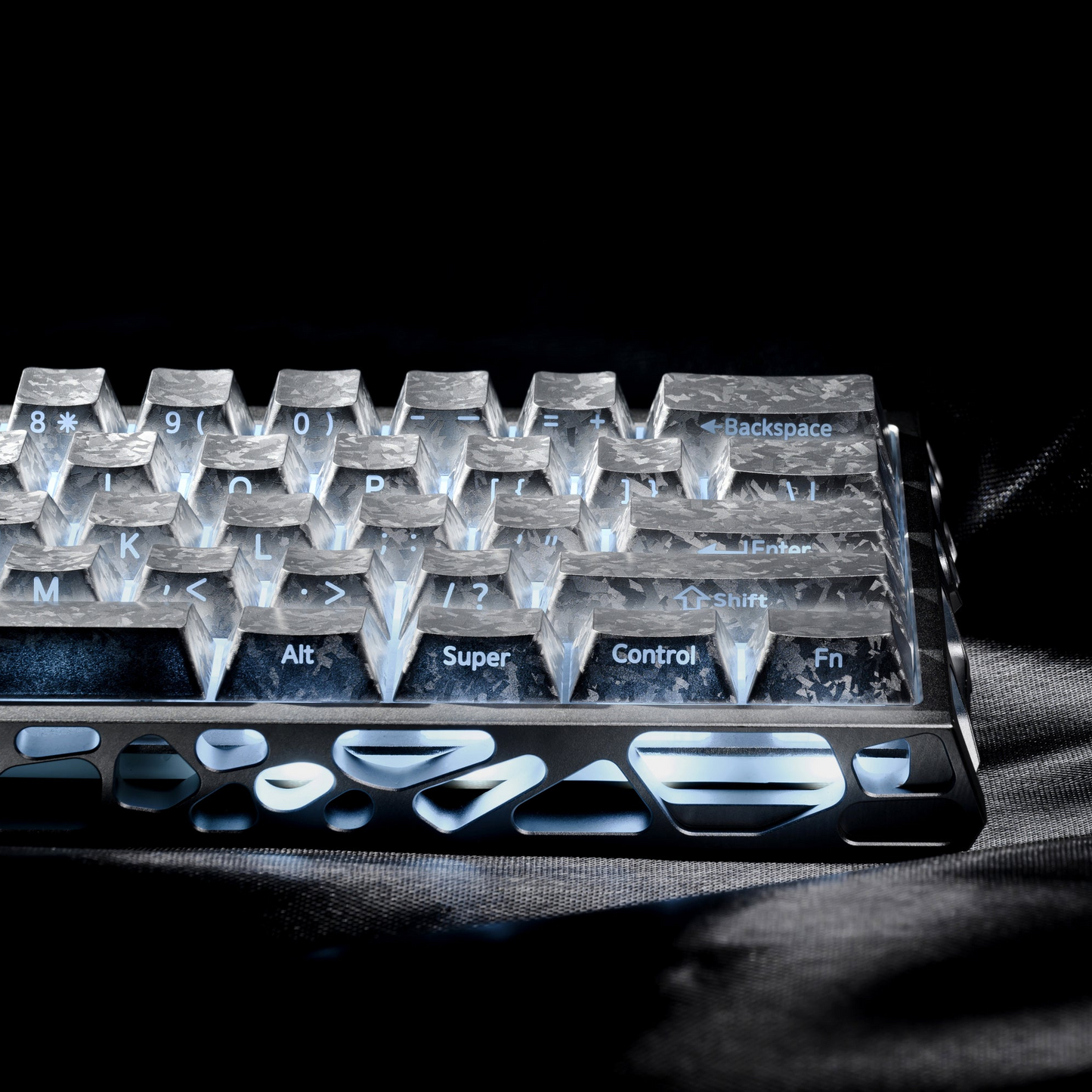 Clear cherry-profile PC keycaps with side-printed legends and blue backlight highlights