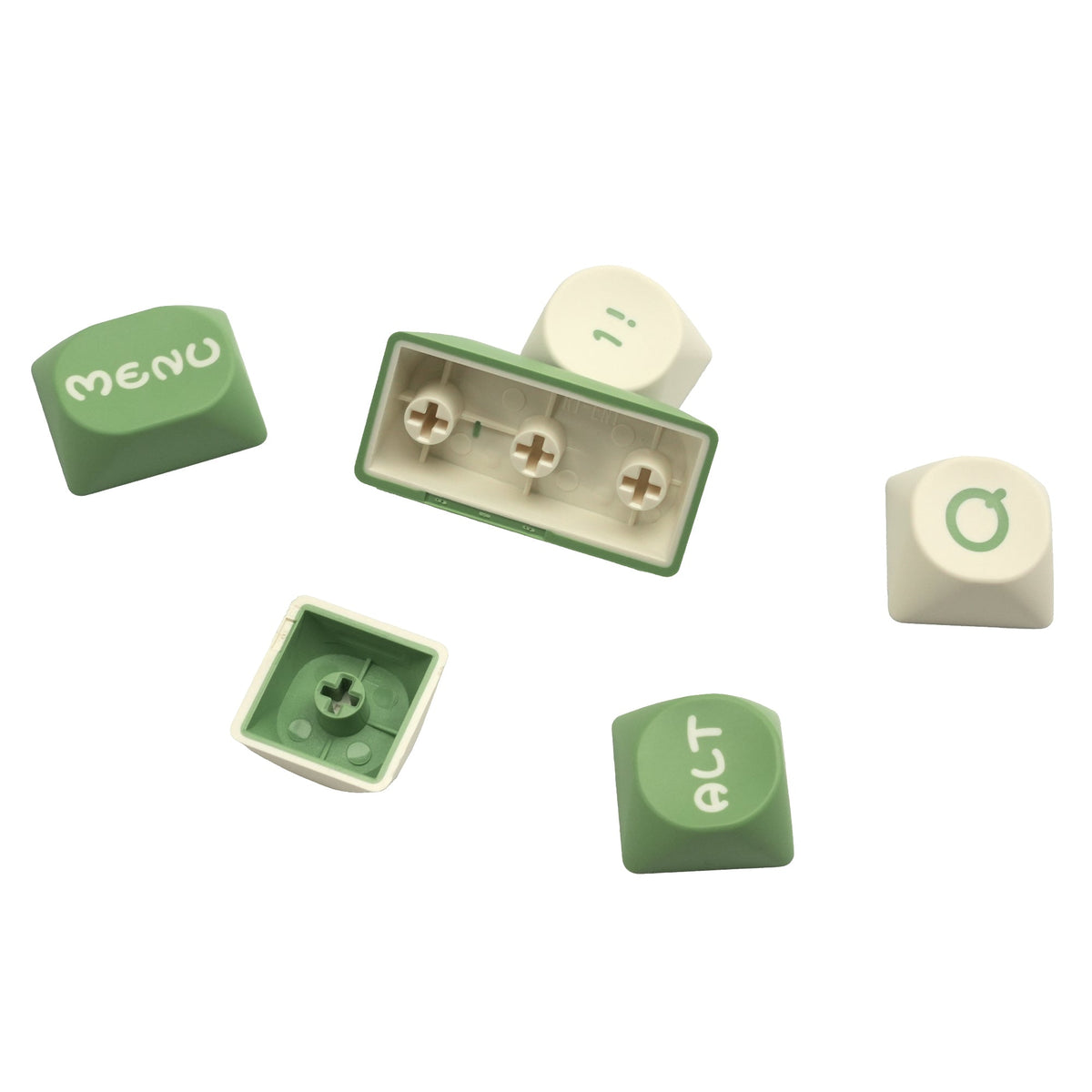 Assorted pastel green keycaps with embossed symbols and switch-stem cutouts