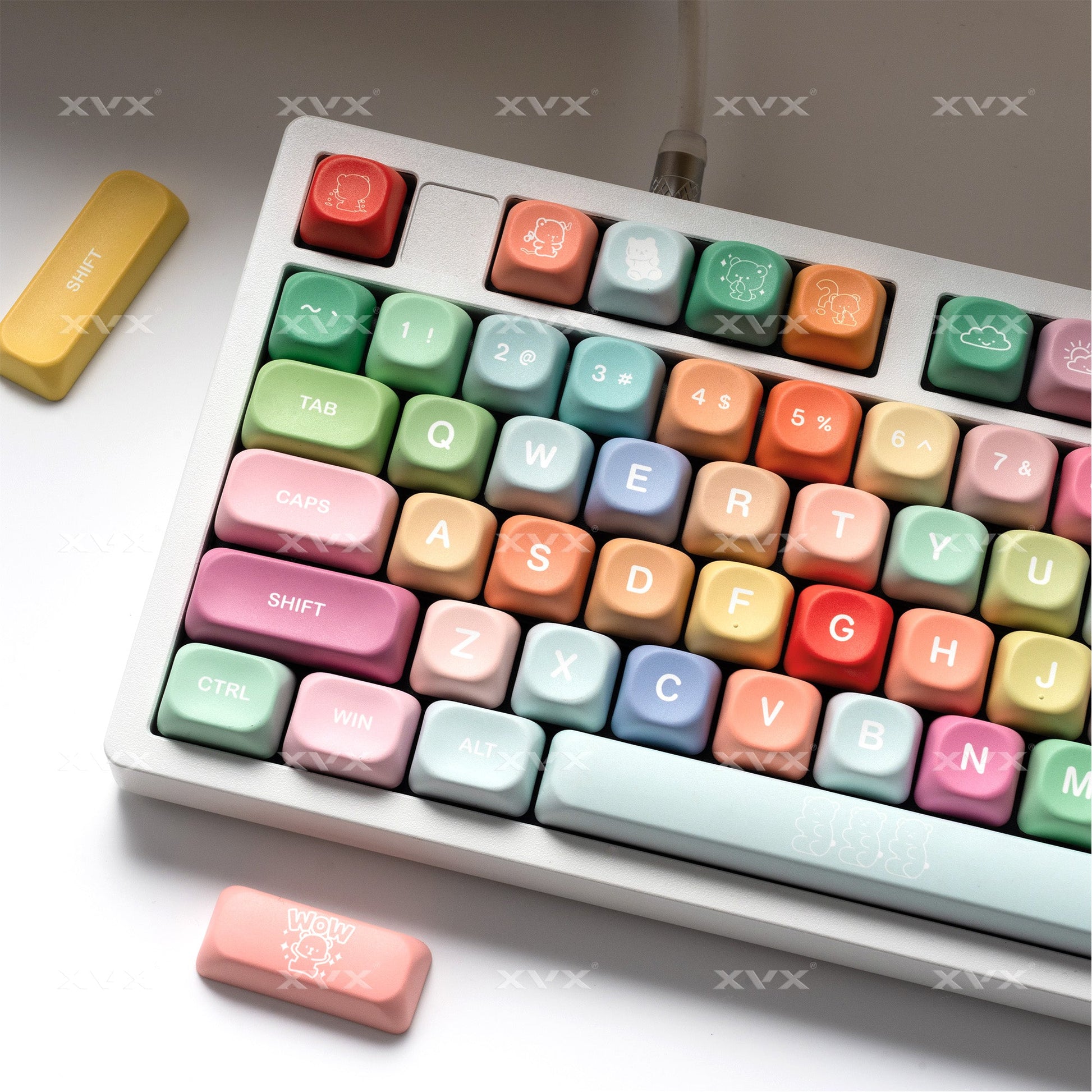 Pastel MOA keycap set on a keyboard, showing QWERTY letter row and numbers