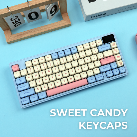 Pastel cream and light blue keycaps with pink accents across full keyboard layout