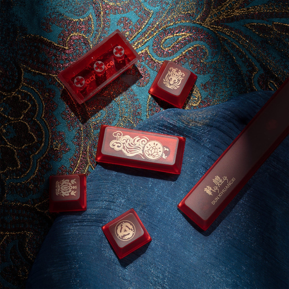 Cherry-profile keycaps with red translucent accents and ornate white character icons
