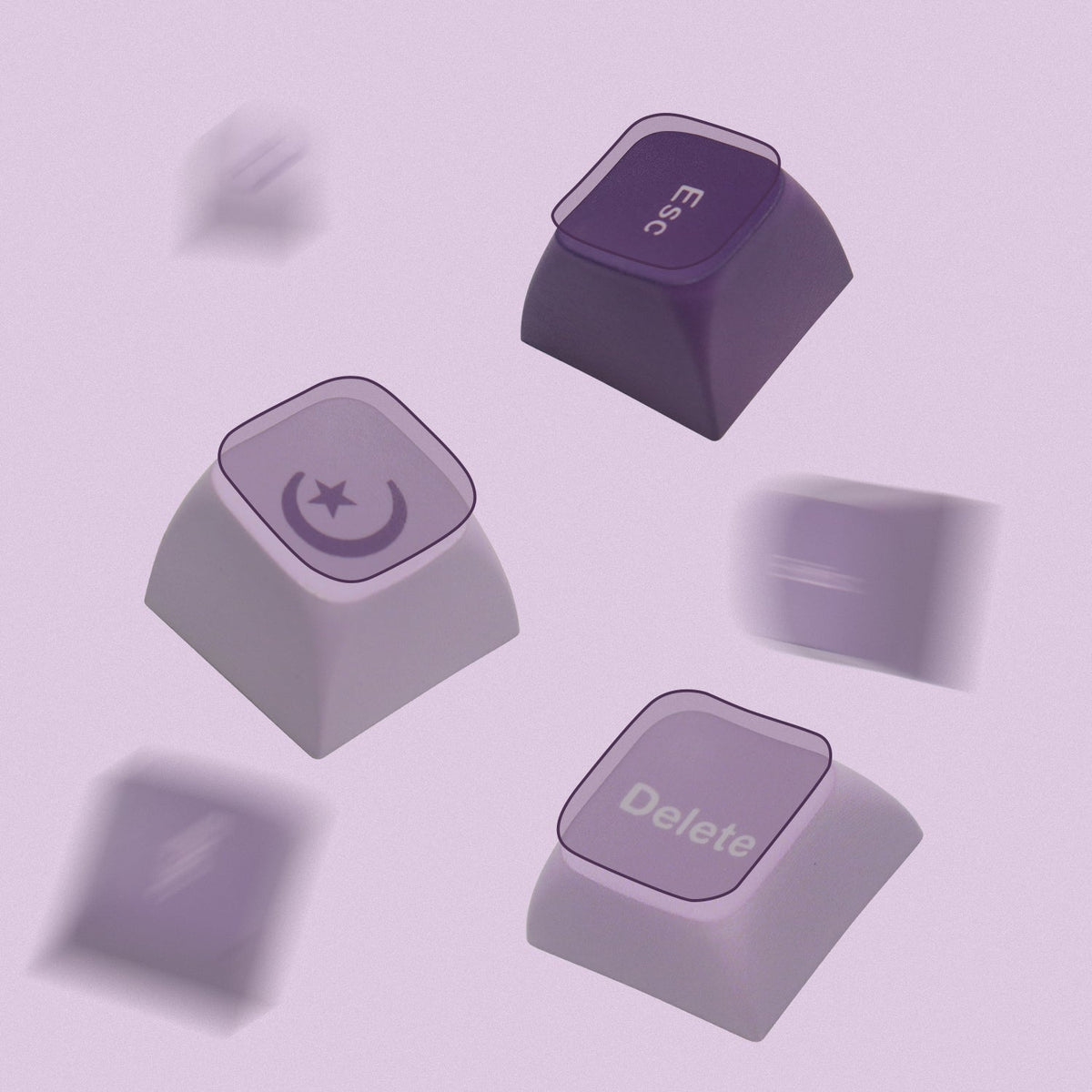 Loose lavender purple and cream keycaps with Delete and star-style icons