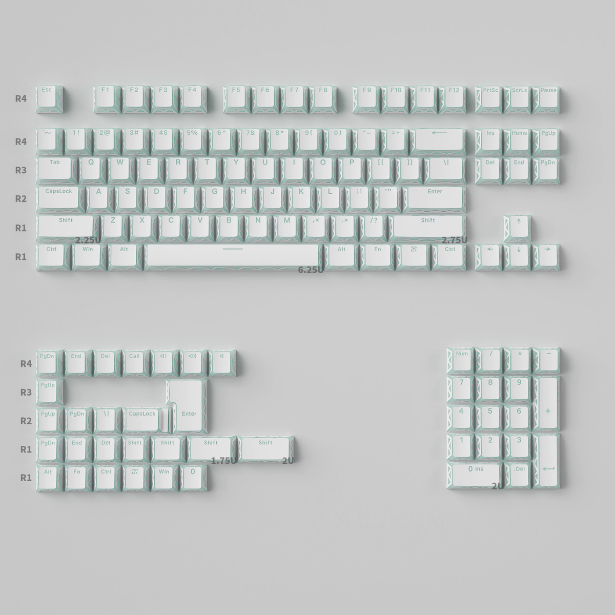 White PBT keycap set with pale mint prism legends, showing the 130-key layout