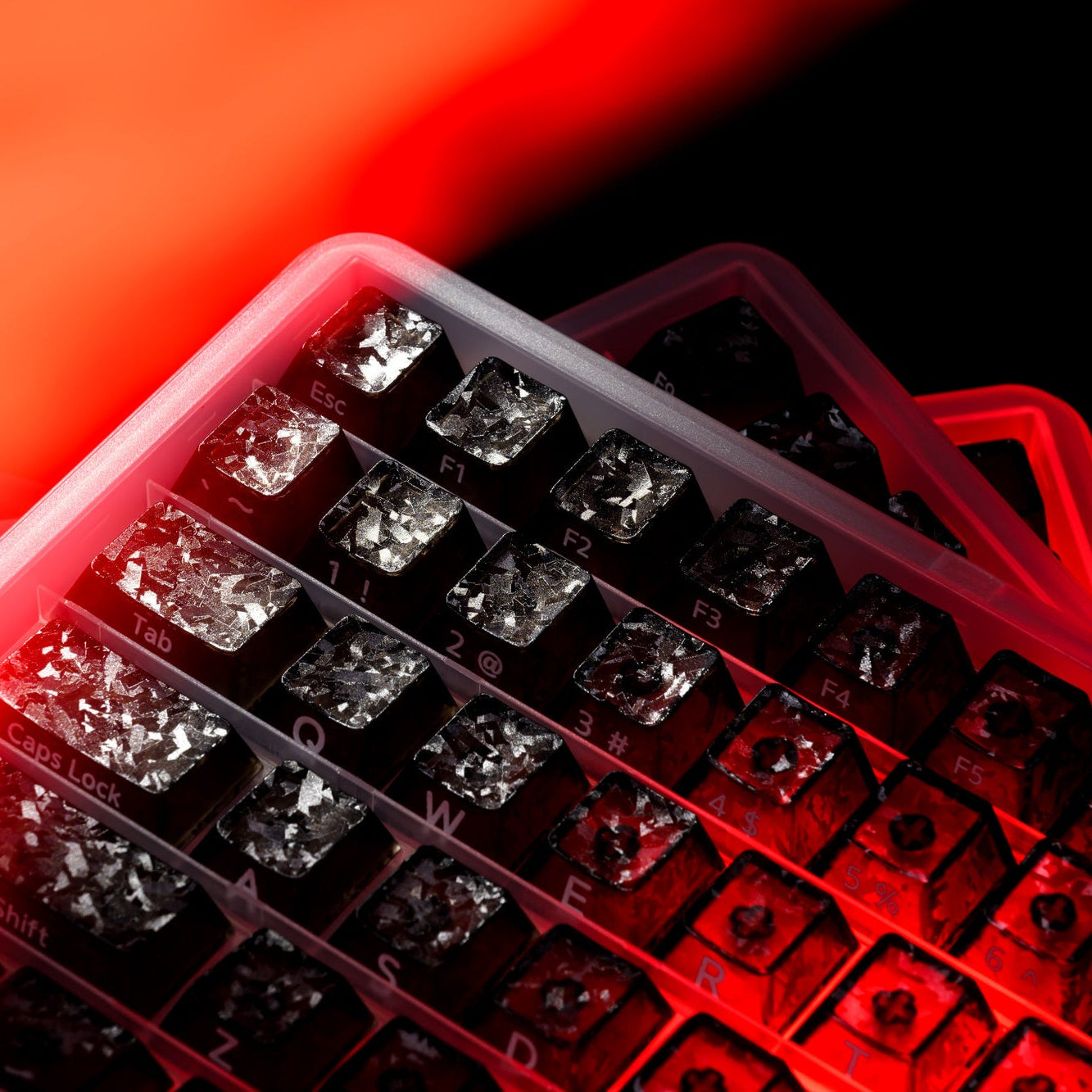 Black PC keycaps with forged carbon-look texture and side-printed legends, close-up
