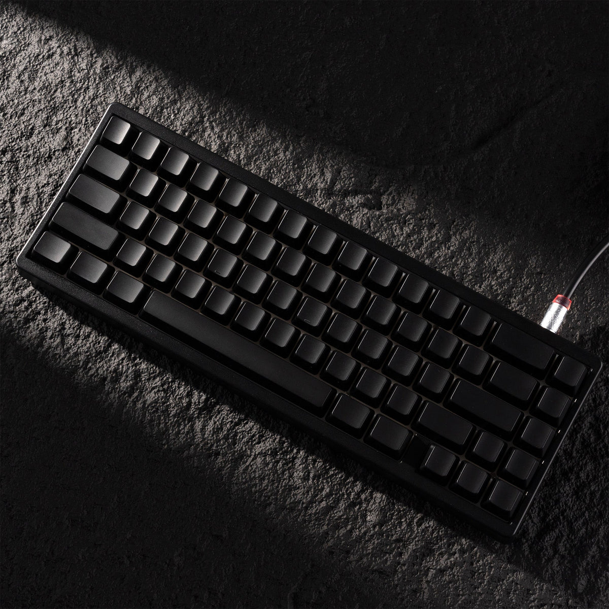 Black keycap set with shine-through legends, full key grid in a compact layout