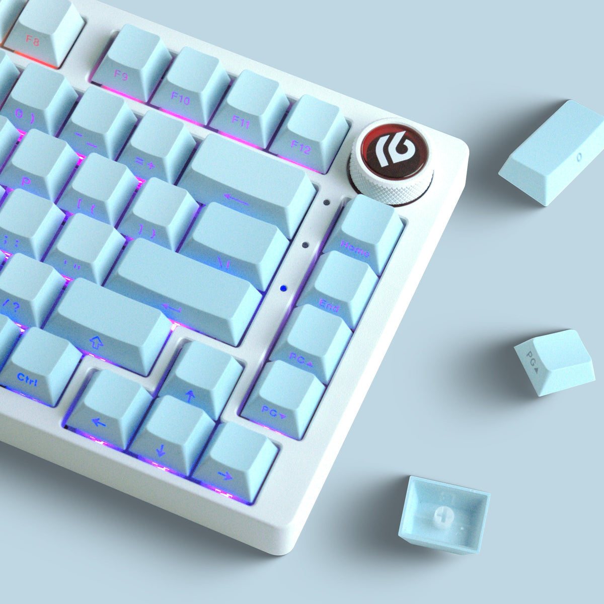 Cherry-profile keycap set with light blue keys and multicolor illuminated legends