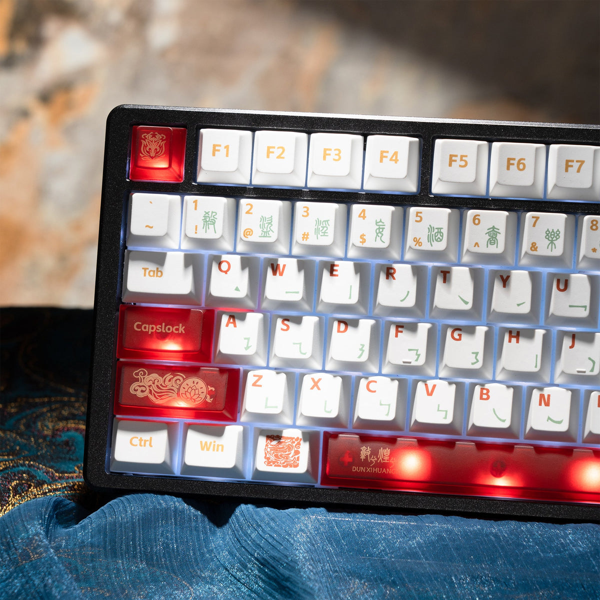 Cherry-profile keycap set with white keys and red backlit accents on the function row