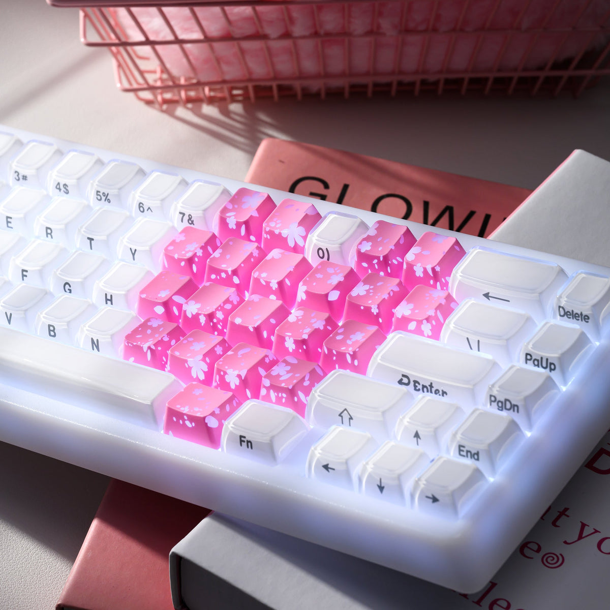 White keyboard keycaps with pink backlight; butterfly cutouts and visible key legends