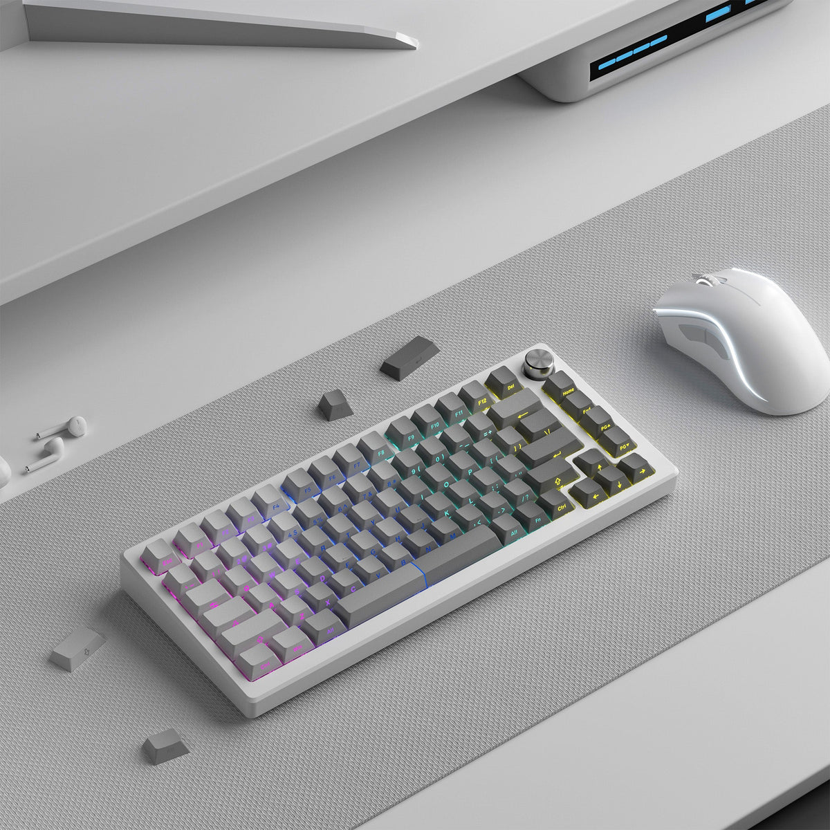 Cherry-profile keycap set on a desk surface, light blue keys with multicolor legends