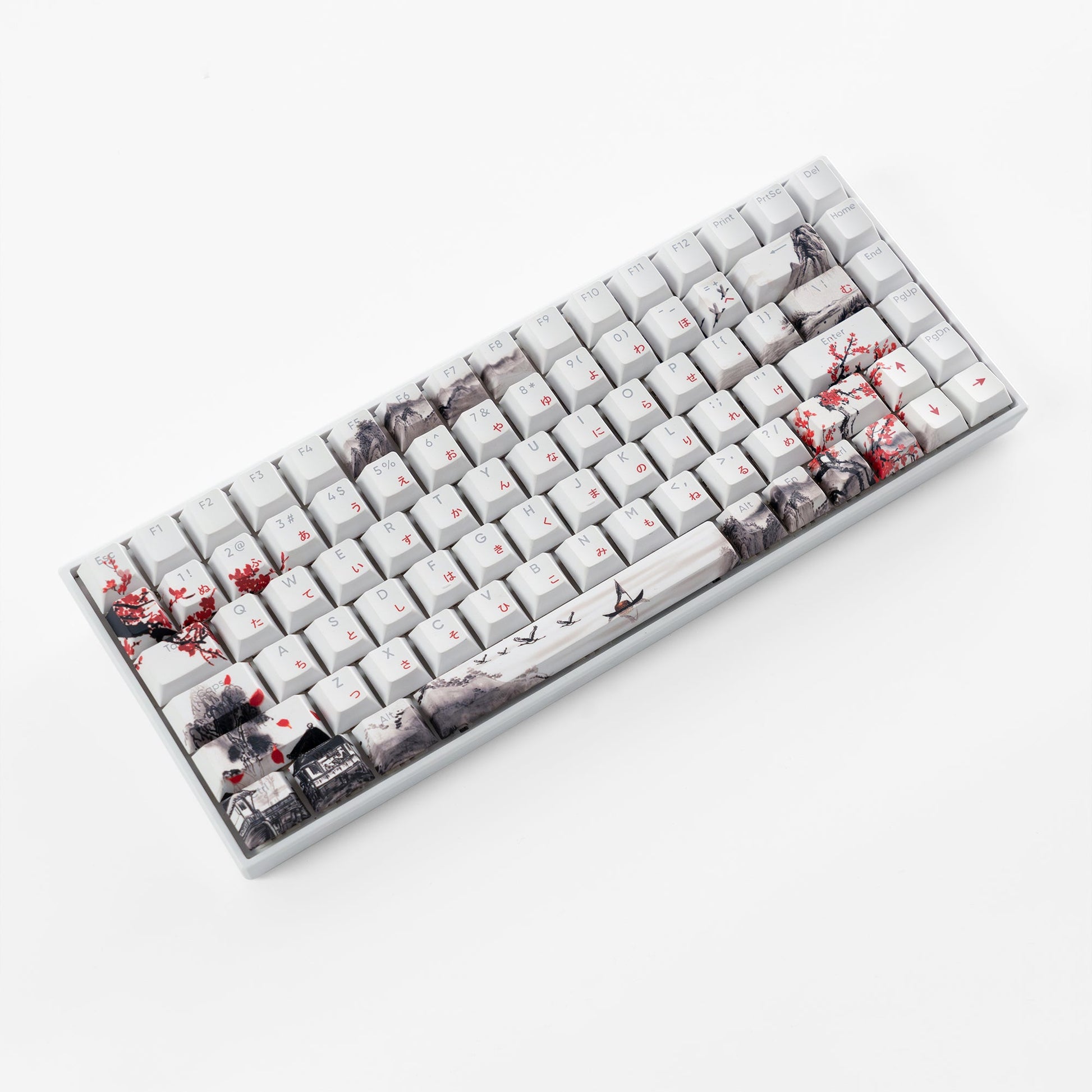 White Cherry-profile keycap set with cherry blossom and cityscape prints, angled view