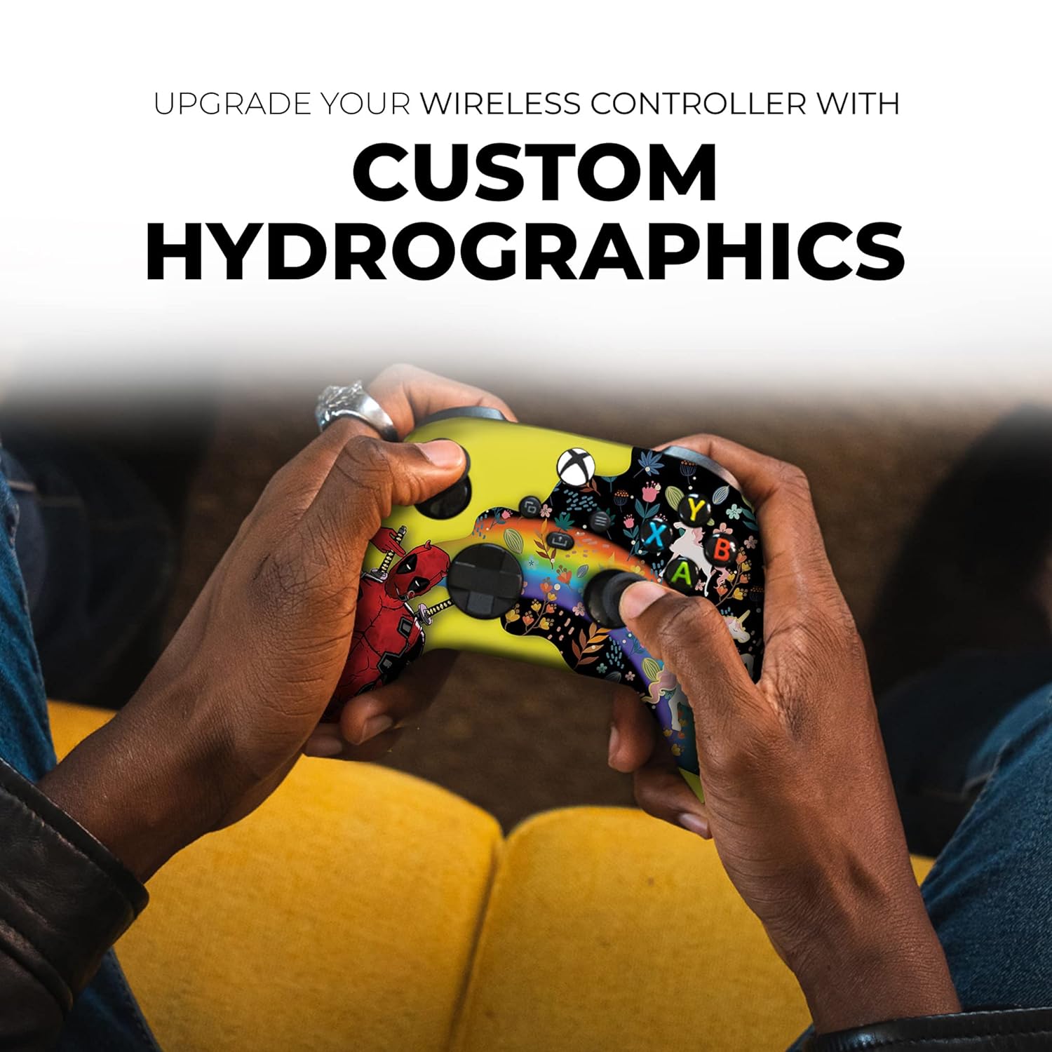 Custom Xbox Series X controller in hands, yellow body with Deadpool-unicorn hydrographic print