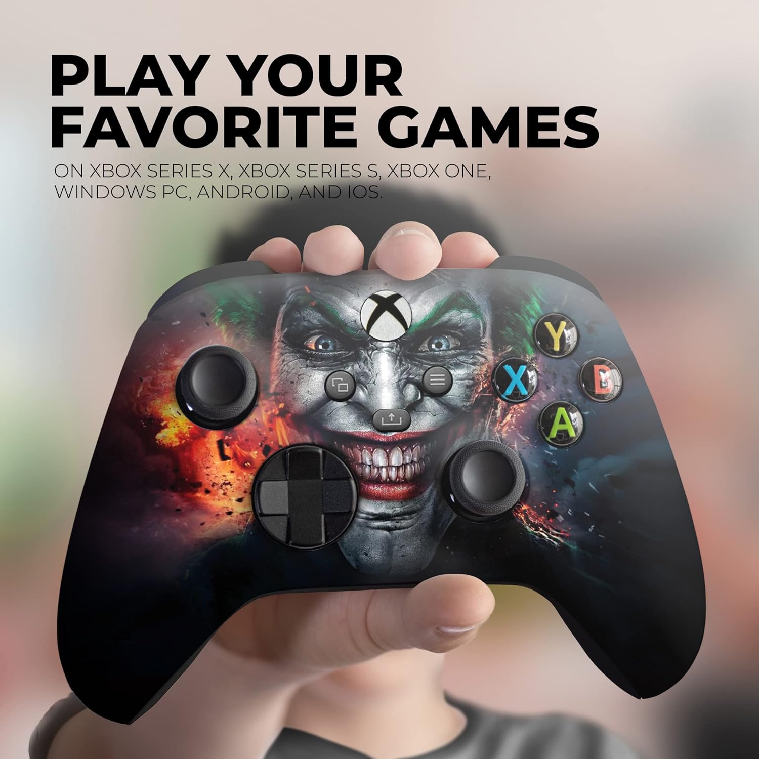 Xbox Series X controller held in hand with joker face graphic and ABXY buttons