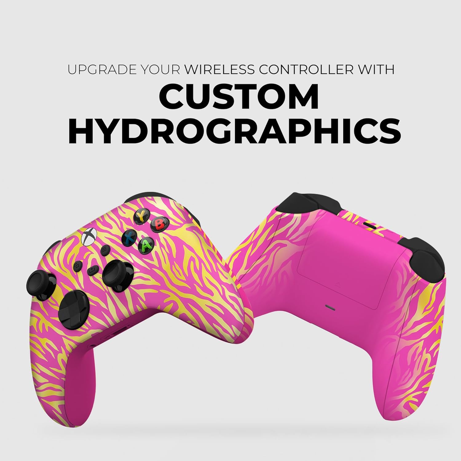 Wireless gaming controller pair with pink yellow tiger-print skin and black control sticks