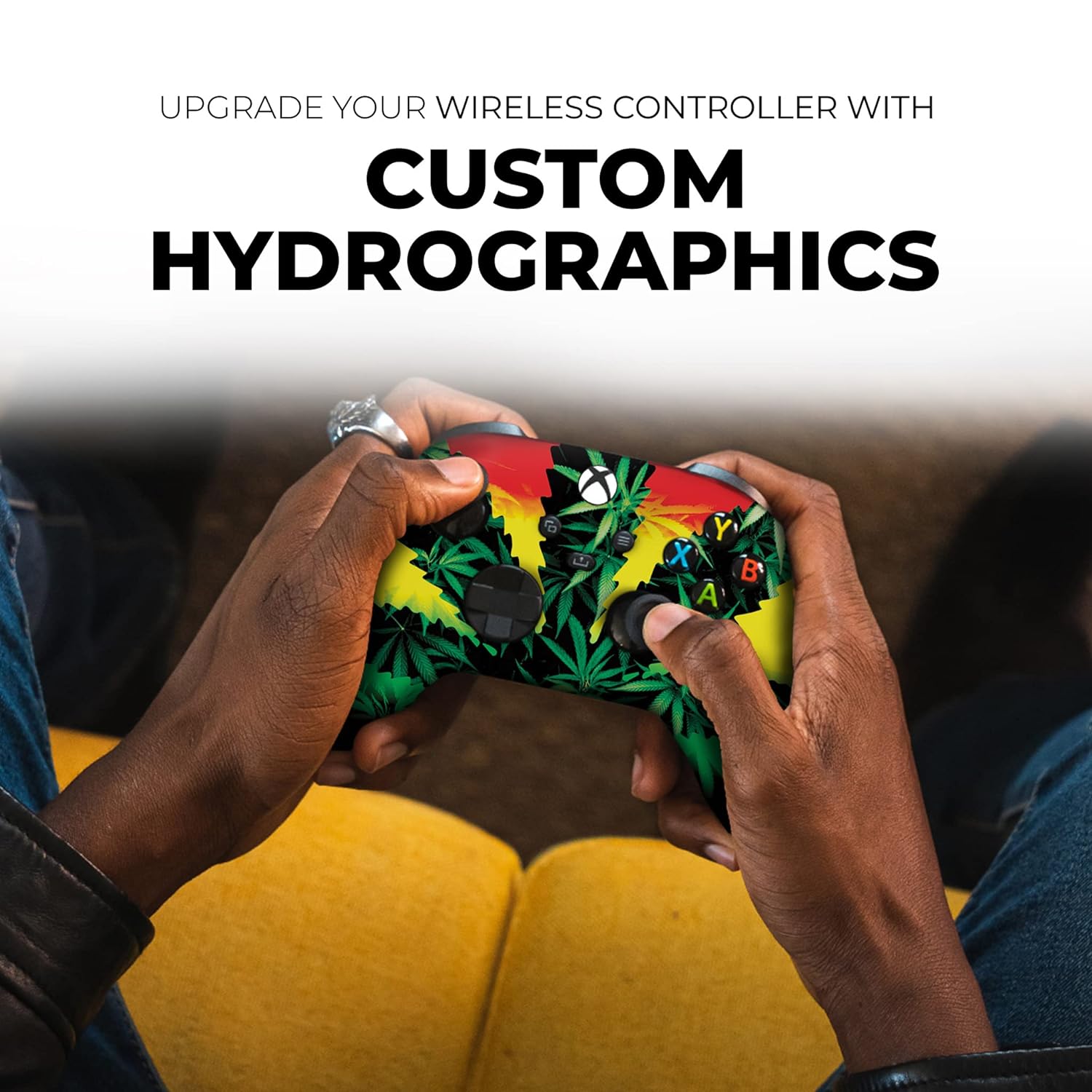 Xbox Series X controller with weed-leaf graphic held by hands, black thumbsticks