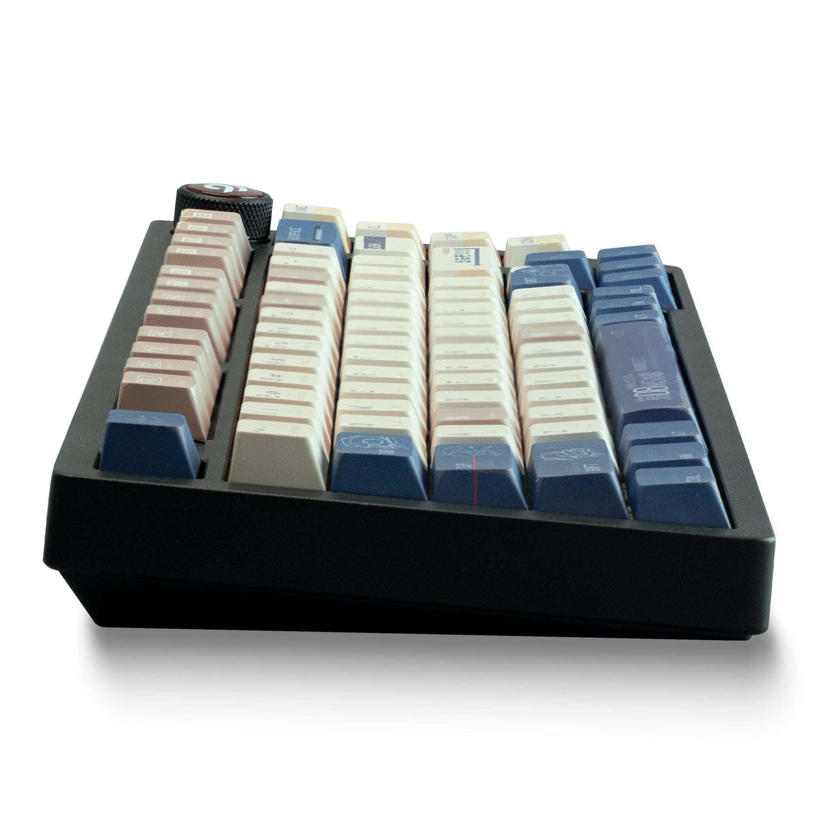 Stacked cherry-profile keycaps in cream and blue, close-up of full set