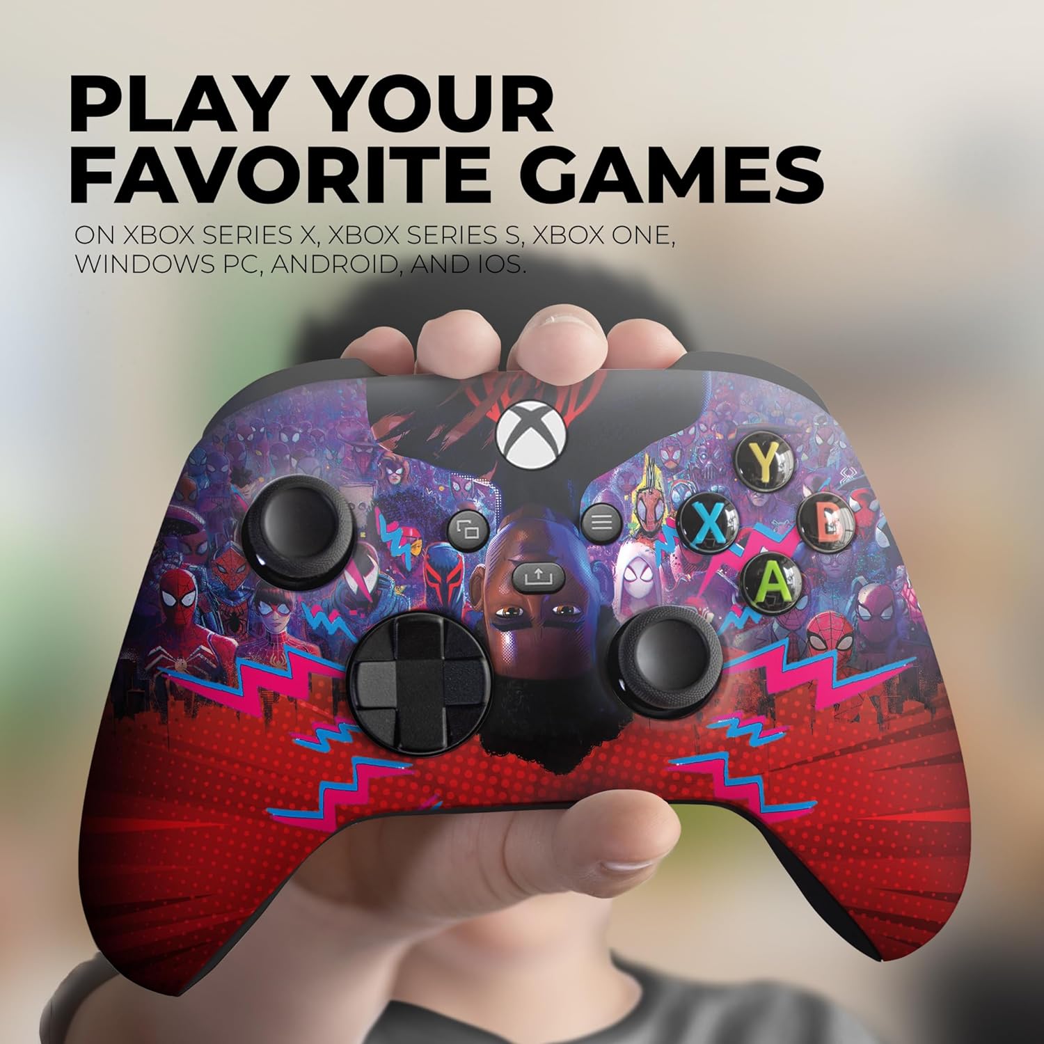 Hand holding Xbox controller with Spider-Verse Miles purple-red artwork and ABXY icons