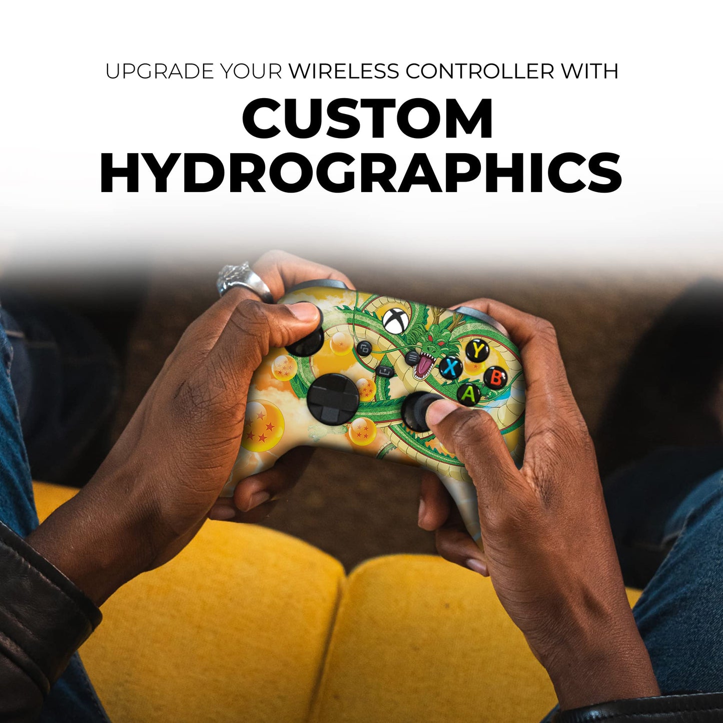 Hands holding Xbox wireless controller with Dragon Shenron-style hydrographic face print.