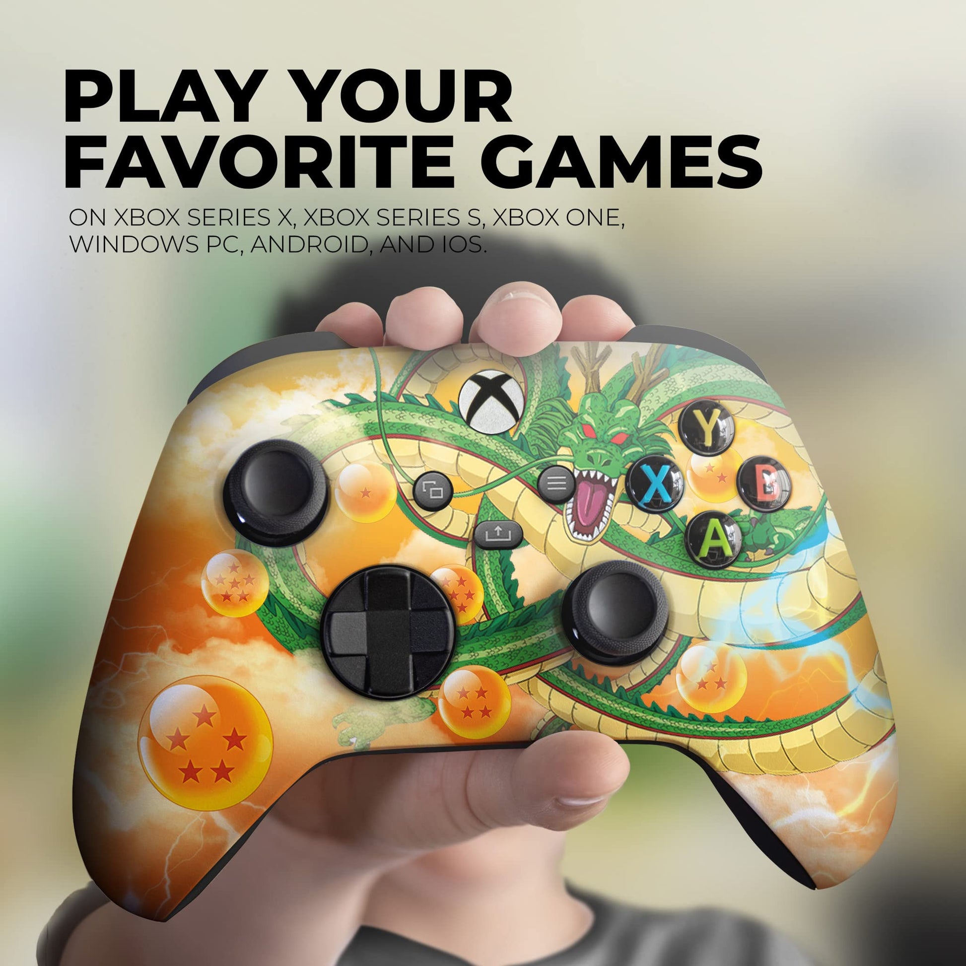 Hand holding Xbox controller with Dragon Shenron-style hydrographic front print and thumbsticks.