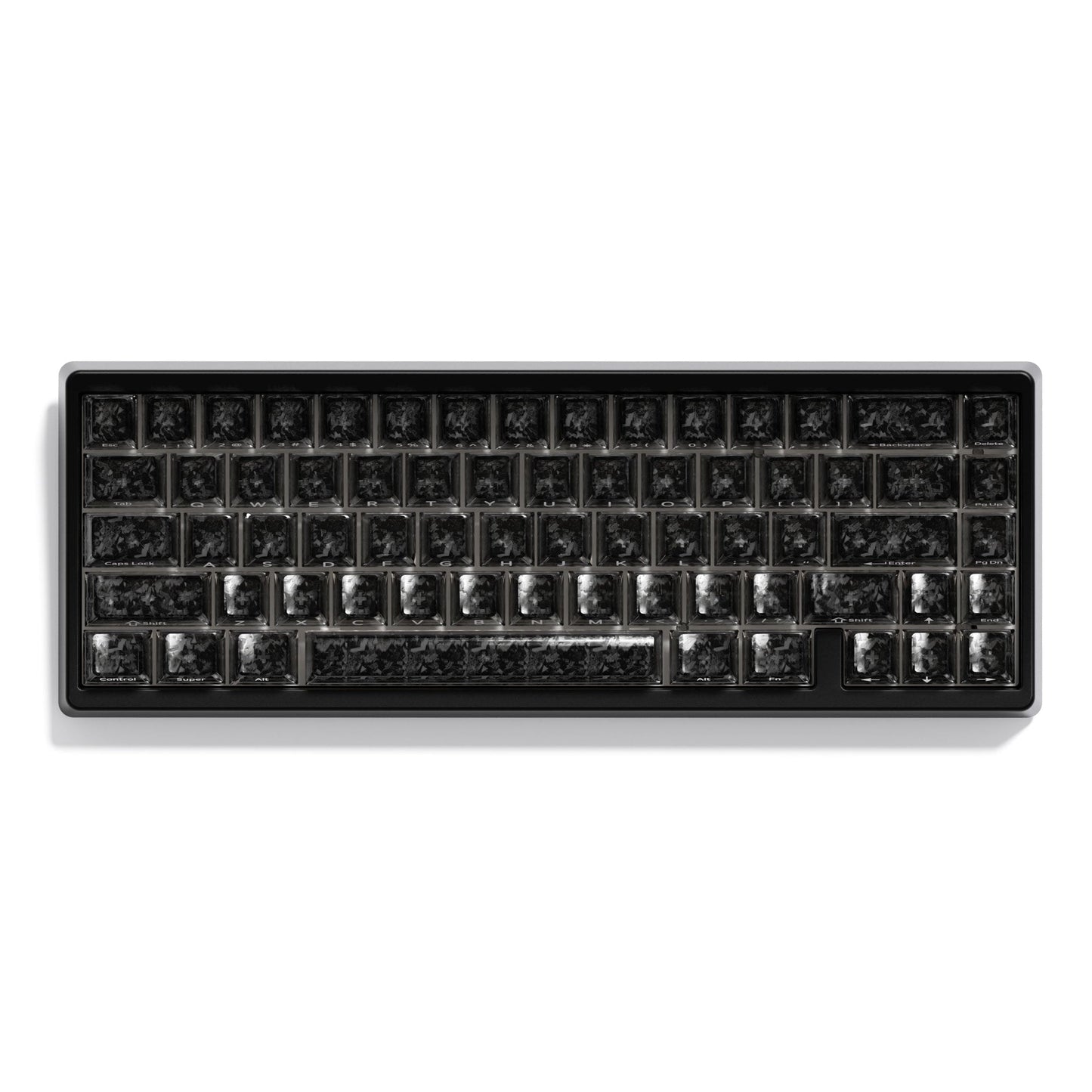 Mechanical keyboard with dark keycaps and subtle metallic shine, straight top view