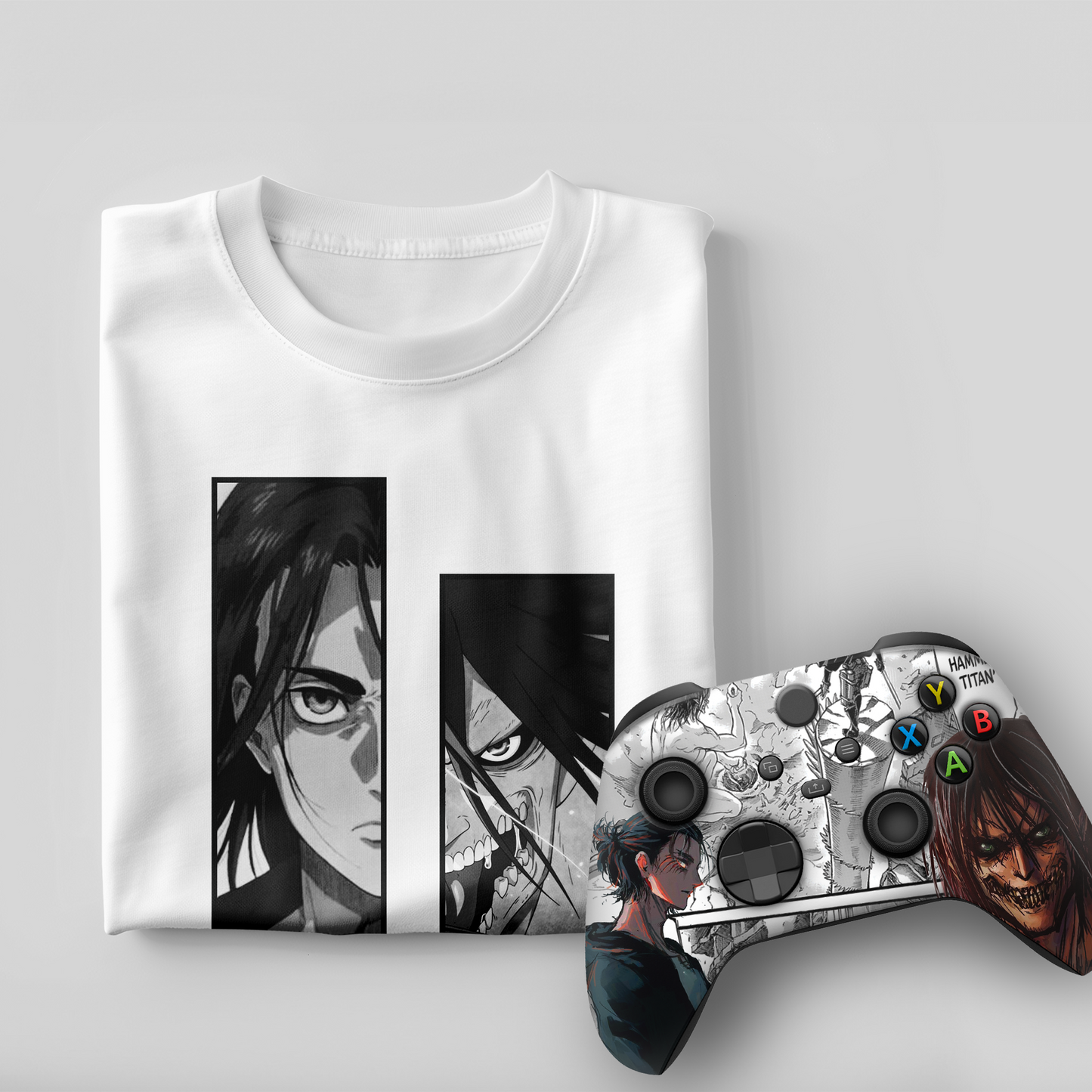 White graphic T-shirt with anime panels; silver Xbox-style controller with themed decals