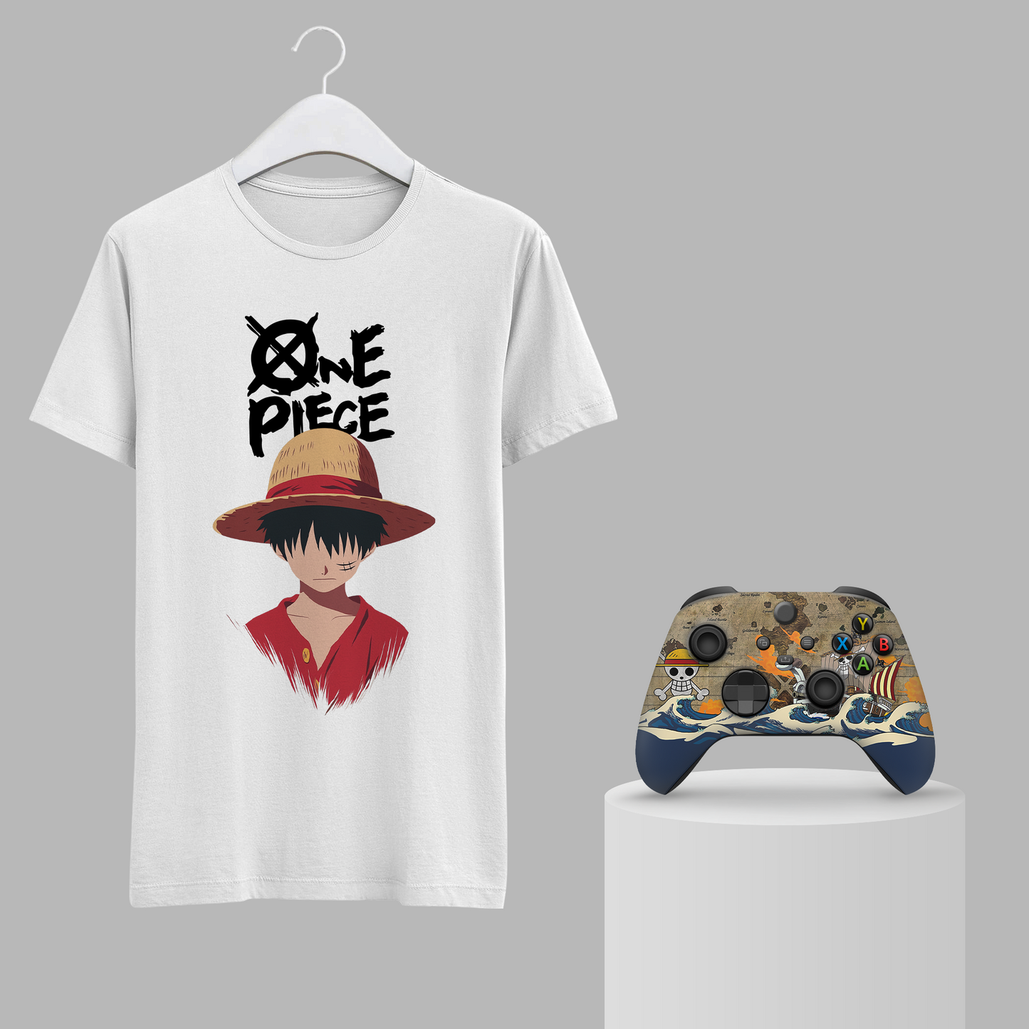 White graphic T-shirt with One Piece character and Xbox controller on stand